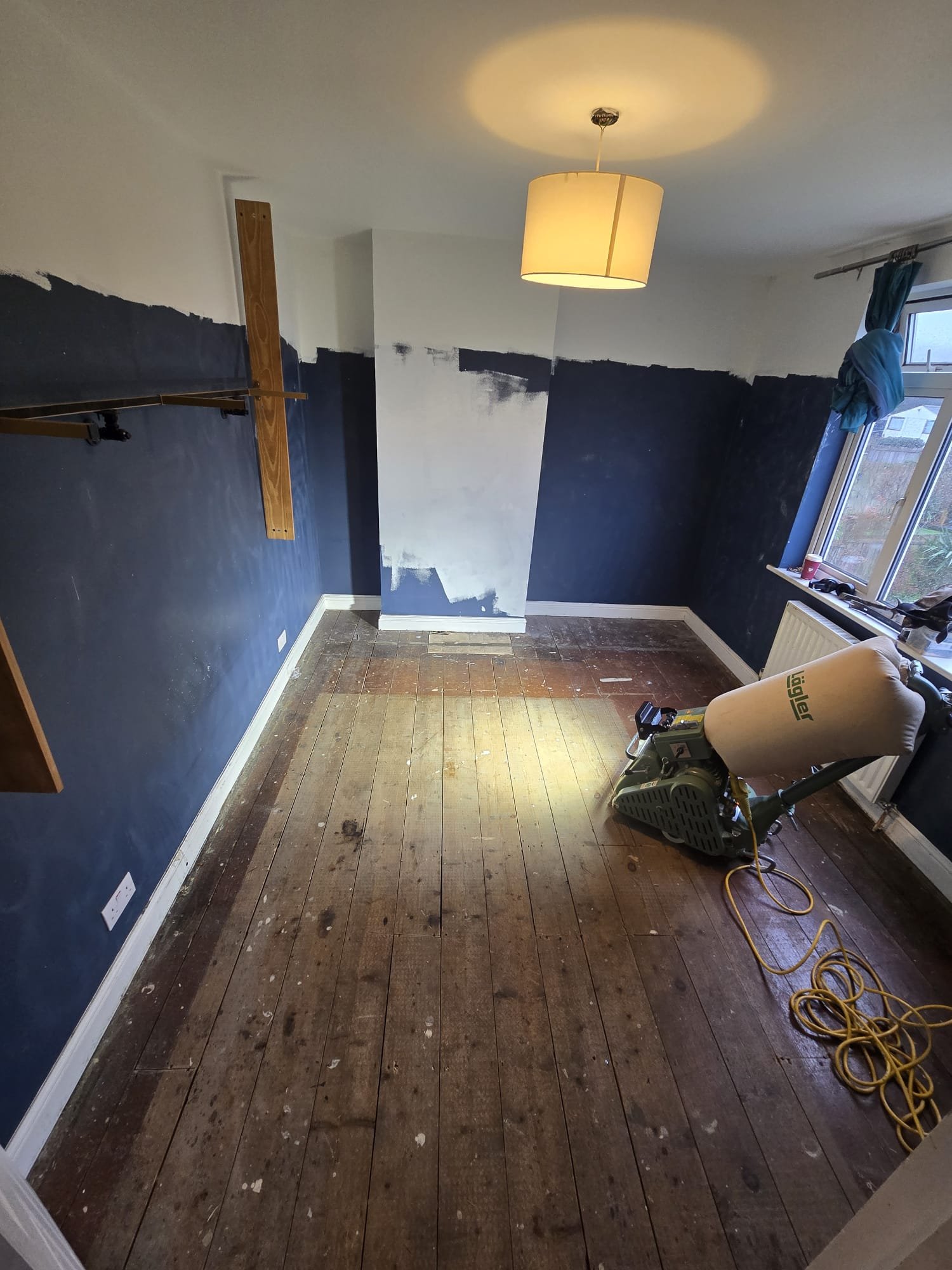 Creaky, damaged Victorian floorboards before sanding